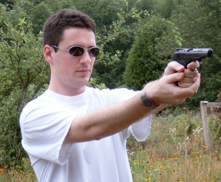David Veksler firing a gun
